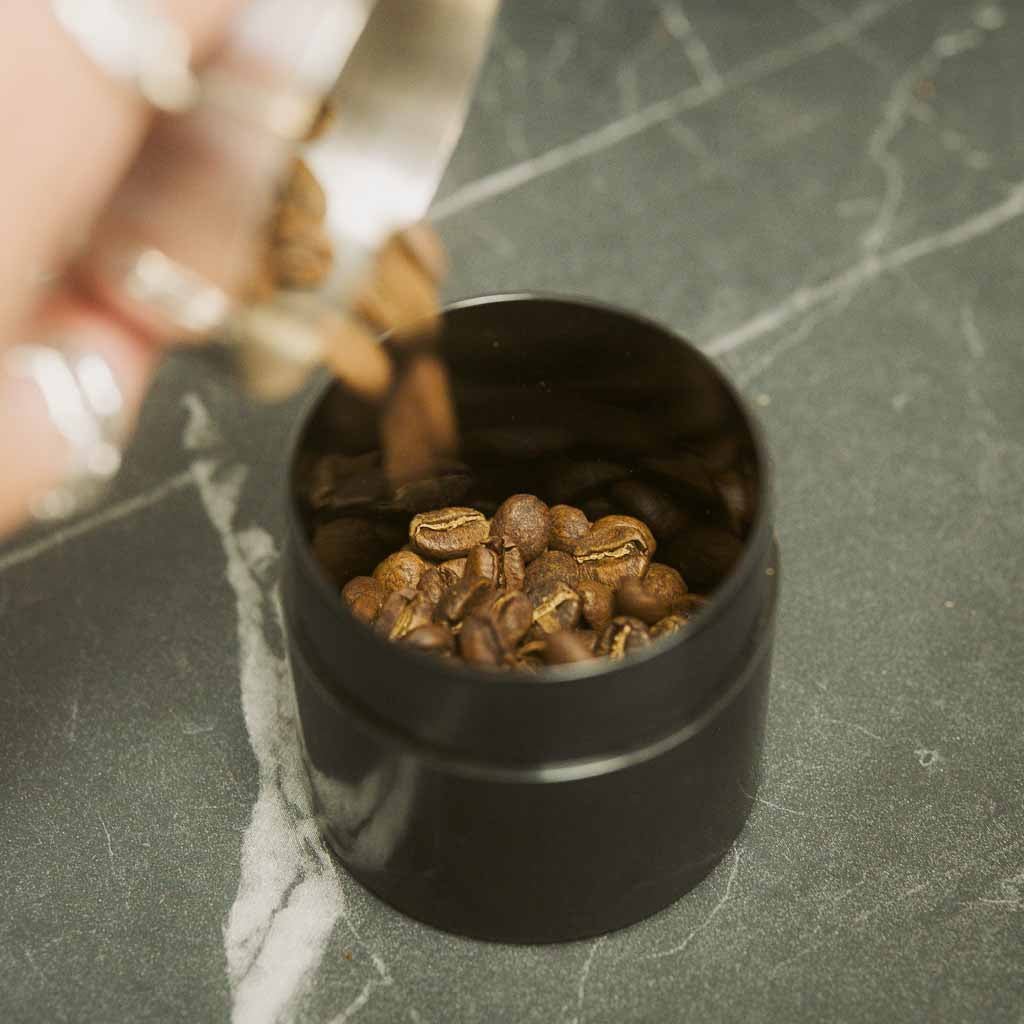 CoffeeVac 40g Black Airtight Coffee Storage Container - Barista Supplies